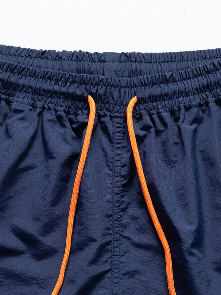 Bouton d'impression de géométrie de couleur Short et short de natation