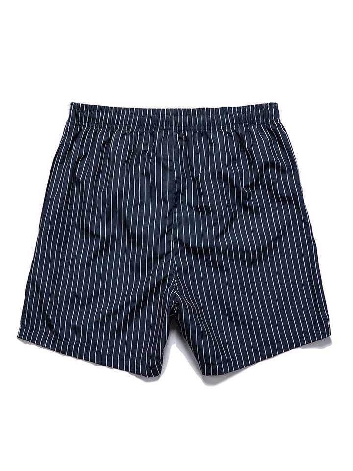 Chemise à boutons imprimée palmiers & Short de bain à rayures