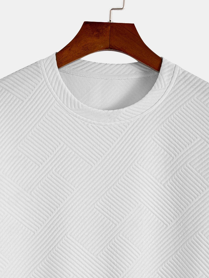 T-shirt à manches courtes en jacquard rayé avec ourlet en arc